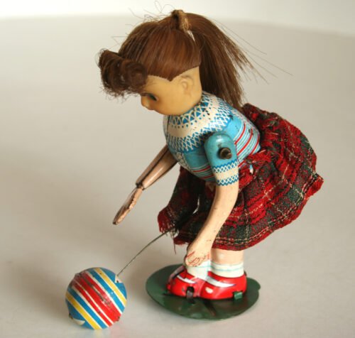 Toplay T.P.S. Japan Girl Bouncing Ball 60’s wind up original tin toy