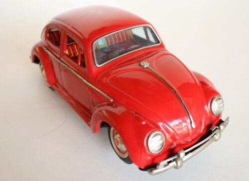 Yoshiya KO Japan 60’s battery operated tin Volkswagen Beetle with blue visible engine with light, original tin toy car