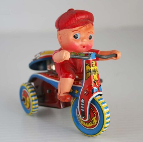1Unknown BrandTWTCelluloidDollOnTricycle