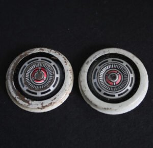 6YonezawaTPCThunderbird1963TwoTinHubcaps