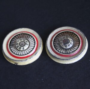 7NomuraTPCFordFairlaneTwoTinHubcaps