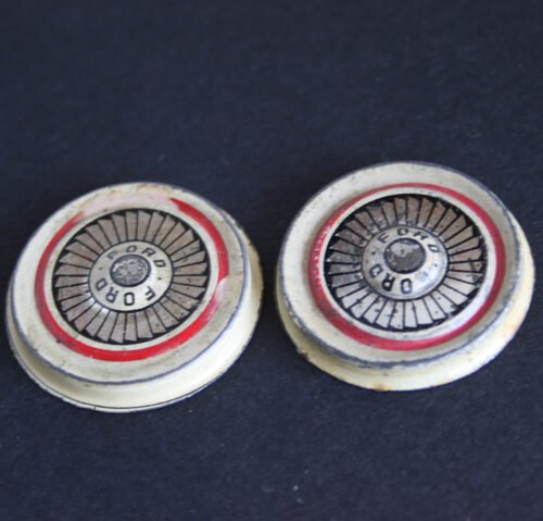 8NomuraTPCFordFairlaneTwoTinHubcaps